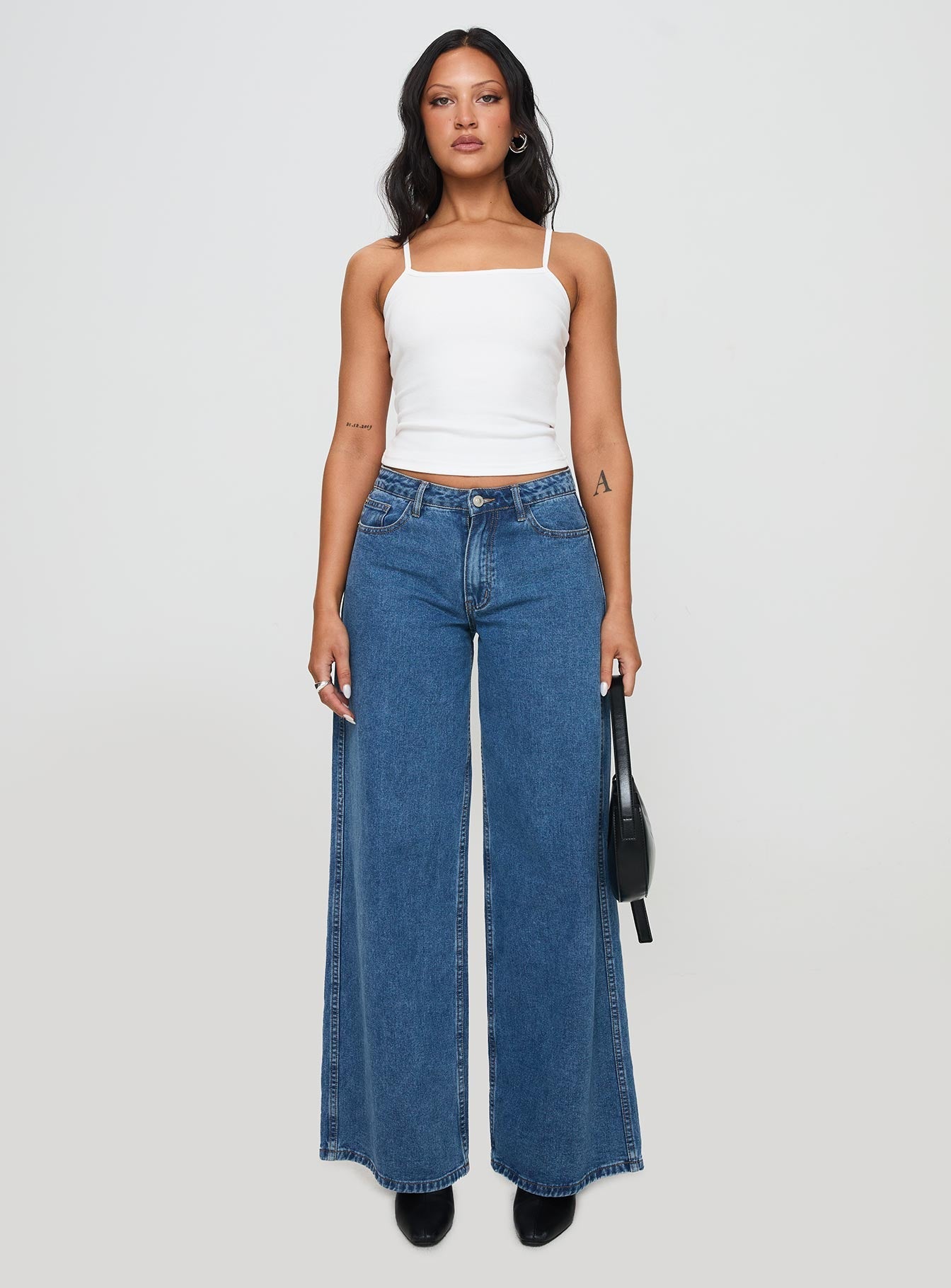 front view of model wearing Princess Polly Baseline Rib Top White Sleeveless Square Neck 