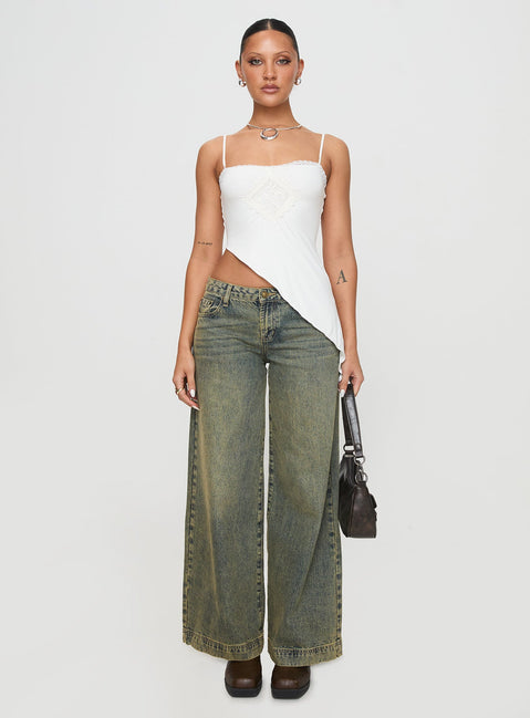 side view of model wearing Princess Polly Amabella Asymmetric Top White Sleeveless Square Neck 