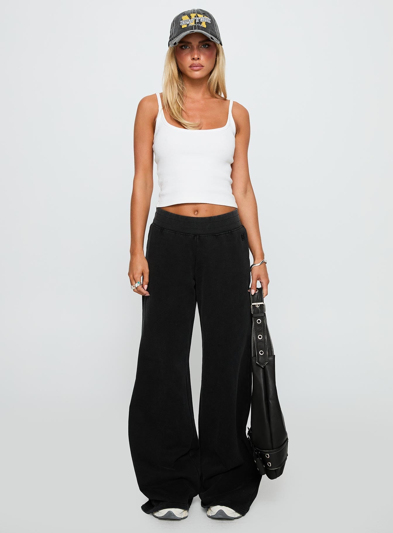 front view of model wearing Princess Polly Summits Flared Track Pants Washed Black High Waisted Pants 
