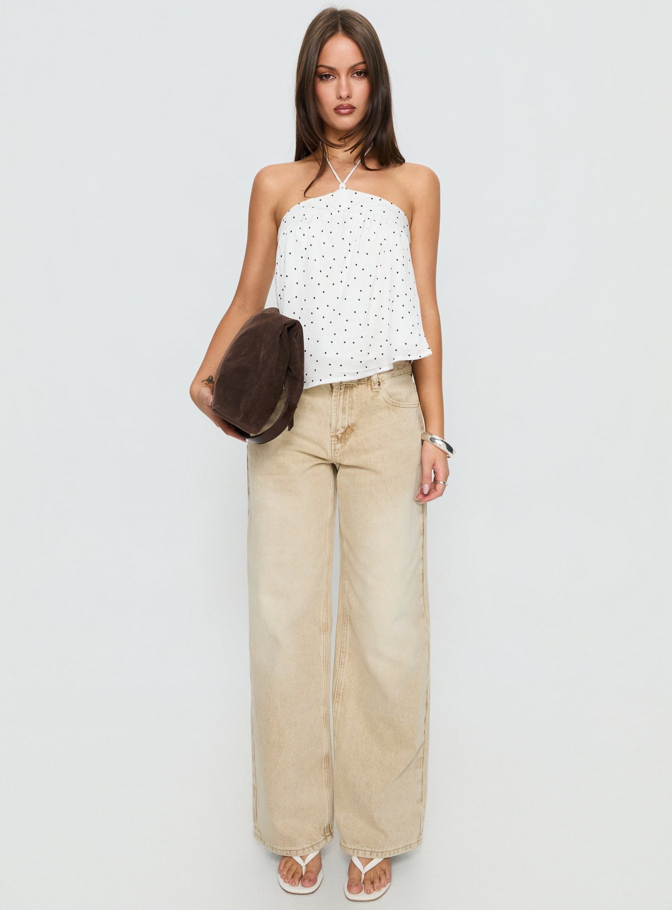 front view of model wearing Princess Polly Serenitia Mid Rise Relaxed Jeans Sandy Brown Wash Mid Rise Jeans 