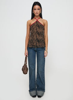 back view of model wearing Princess Polly Rafaella Halter Top Leopard Sleeveless Asymmetric Neckline 