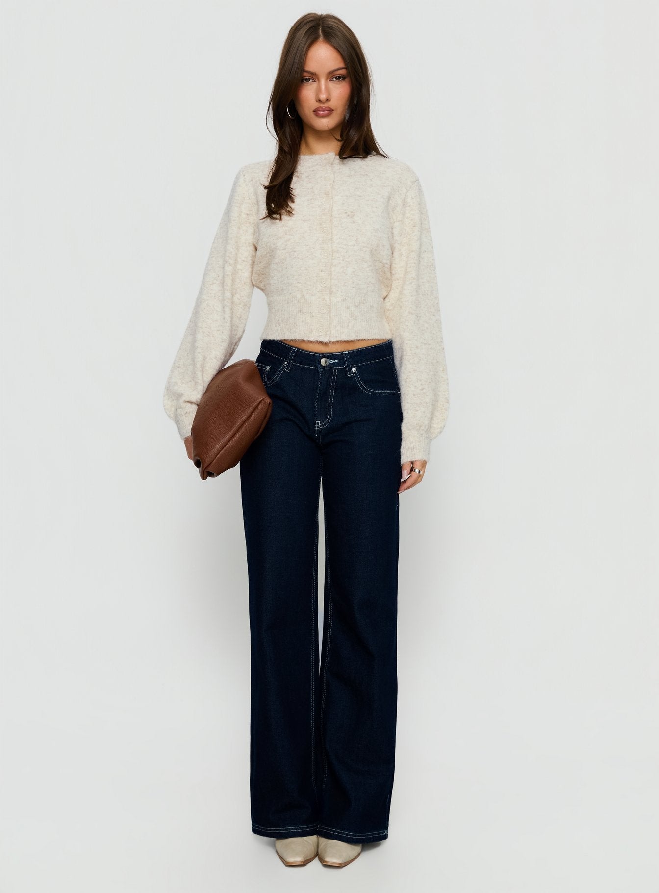 side view of model wearing Princess Polly Dawsen Button Down Cardigan Cream cropped 