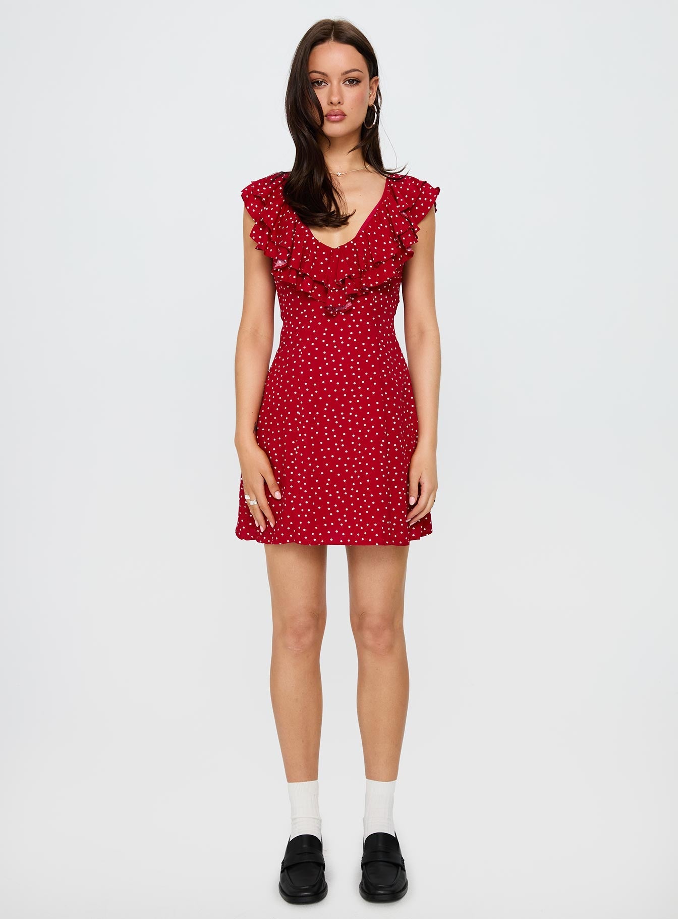side view of model wearing Princess Polly Cherry Schnapps Flutter Mini Dress Red Polka V-Neck 