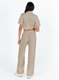 Matching set Geo print Short sleeve shirt Classic collar Button fastening at front Drop shoulder Twin front pockets Pants Elasticated waistband Twin hip pockets Wide leg 