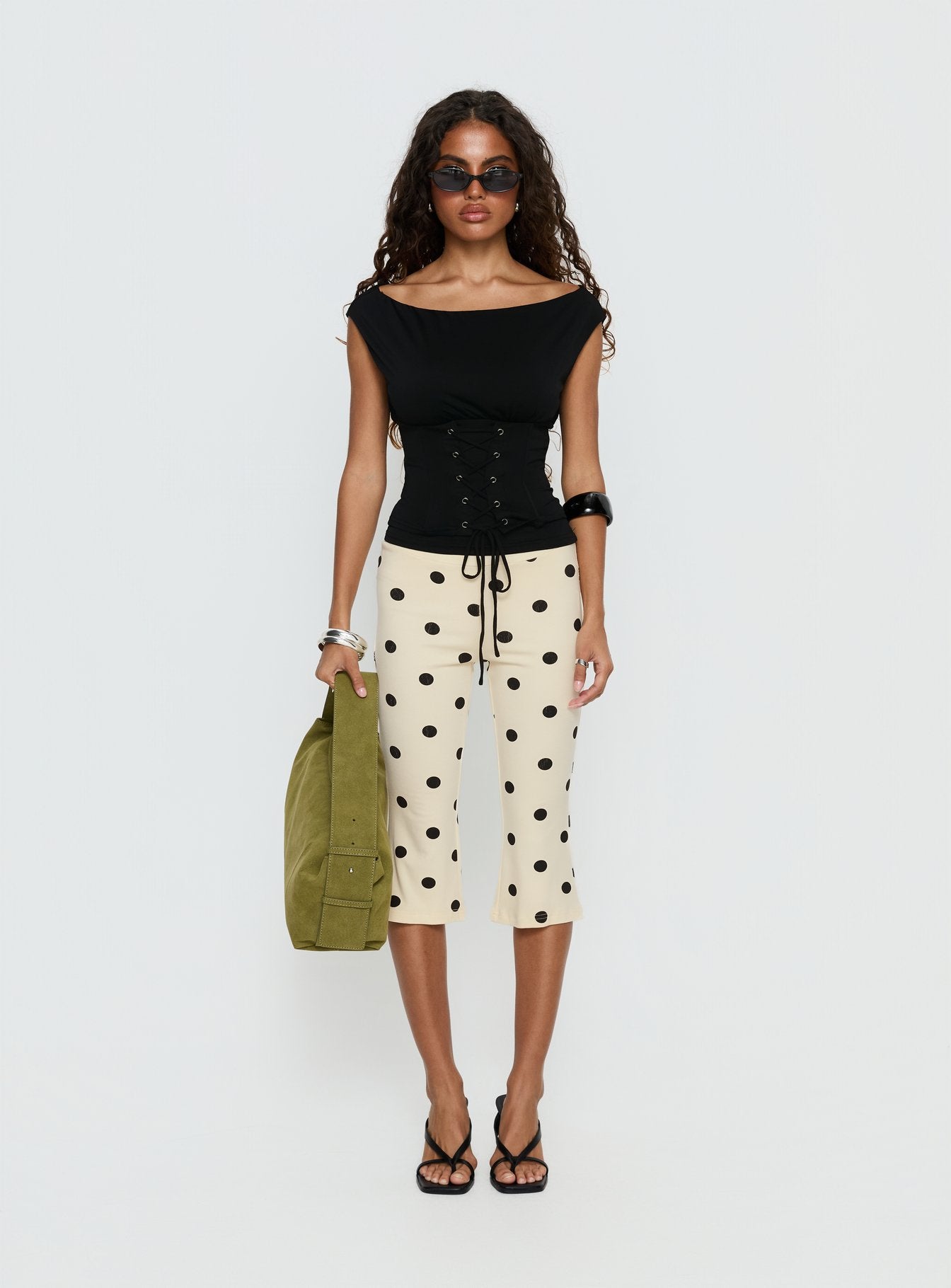 front view of model wearing Princess Polly Samaira Capri Pant Cream Polka Dot Mid Rise Pants 