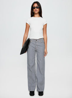 front view of model wearing Princess Polly Top Model Jean Navy Stripe Low Rise Pants 