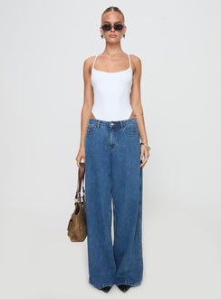 side view of model wearing Princess Polly All Tied Up Bodysuit White Tall Sleeveless 