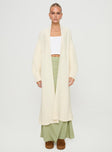 Longline cardigan Cable knit material, drop shoulder, ribbed trim Good stretch, unlined 