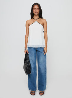 front view of model wearing Princess Polly Rafaella Halter Top Cream Sleeveless Asymmetric Neckline 