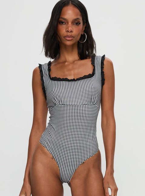 front view of model wearing Princess Polly Trustfund Lace Trim Bodysuit Black / White Check Sleeveless 