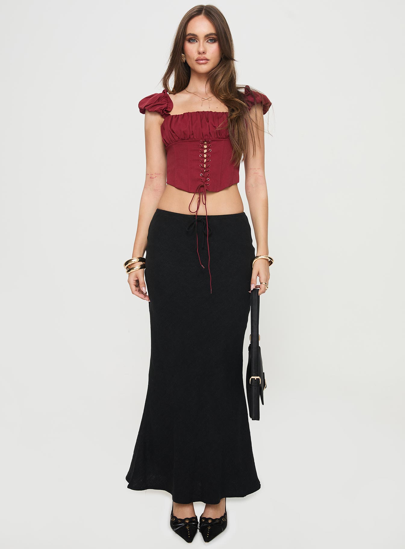 Corset top Cap sleeve, boning throughout, pleated bust, curved hem, zip fastening at back Non-stretch material, fully lined