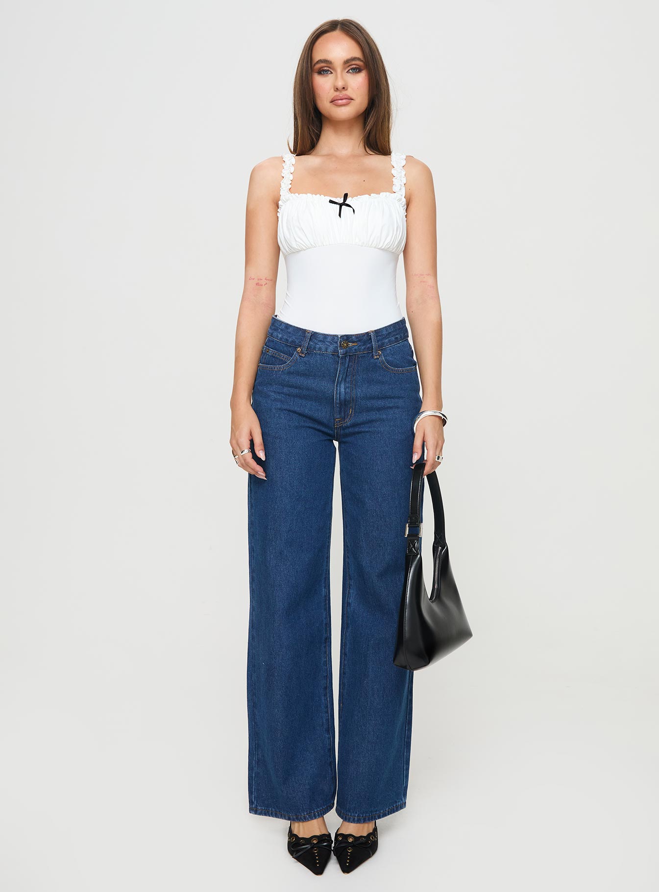 Bodysuit Elasticated shoulder straps, square neckline, ruched bust, high cut leg, press clip fastening, cheeky style bottom Good stretch, lined bust Princess Polly Lower Impact