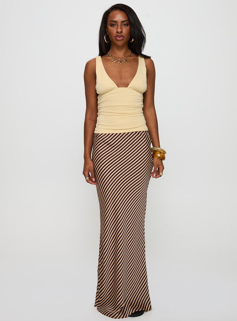 Featuring the Eliena Maxi Skirt Multi Petite in womens-skirts with maxi length and striped print front view of model wearing