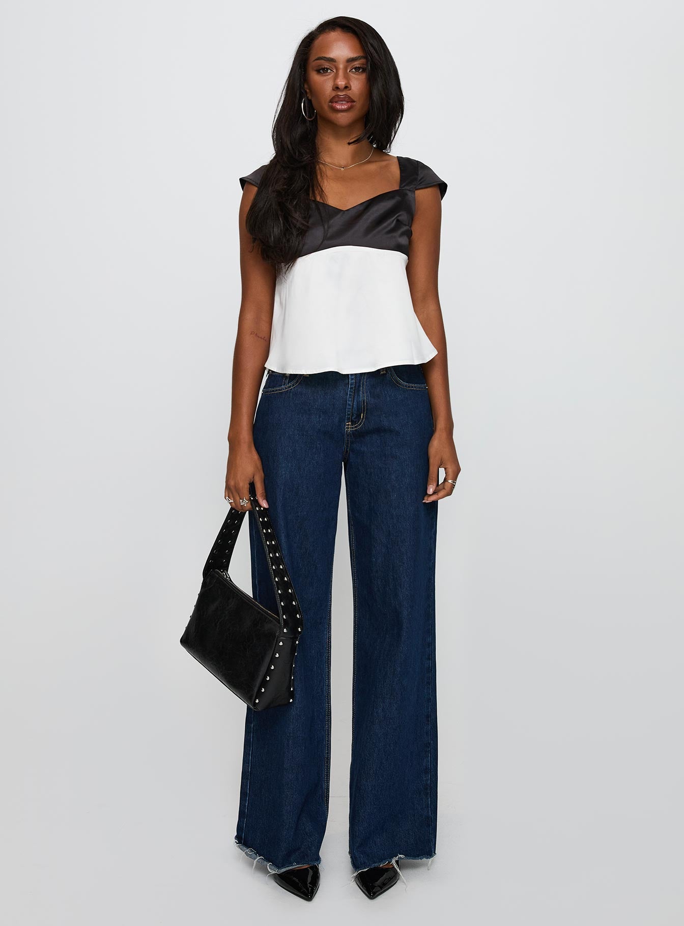 front view of model wearing Princess Polly Think About It Cap Sleeve Top Black / White Short Sleeves V-Neck 