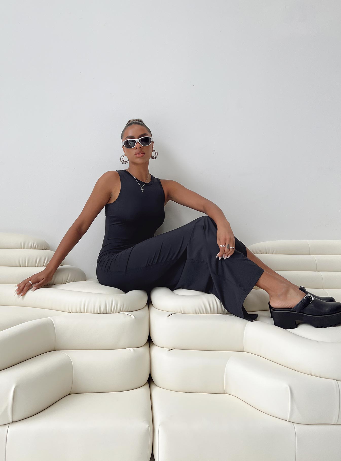 Front view of model wearing  front Princess Polly High Neck  Bena Maxi Dress Black