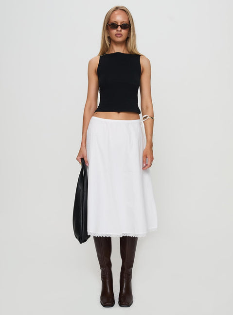   side view of model wearing Princess Polly Taka Midi Skirt White Midi Skirts 
