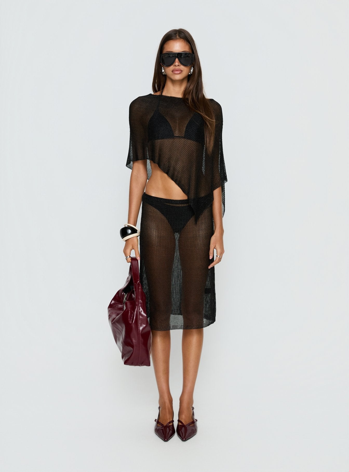   front view of model wearing Princess Polly Luminous Midi Skirt Black 