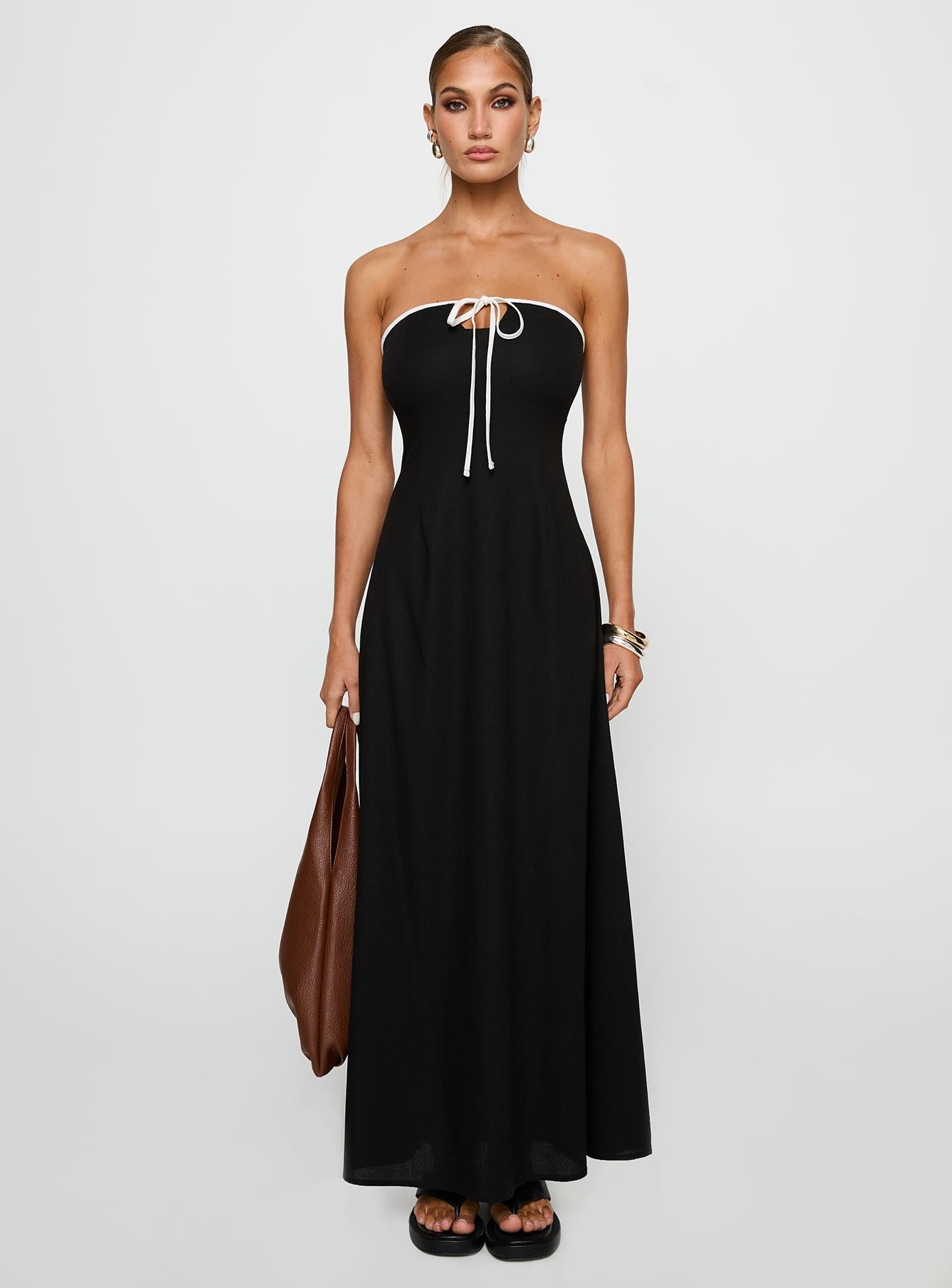 front view of model wearing Princess Polly Bijou Strapless Maxi Dress Black Straight Neck 