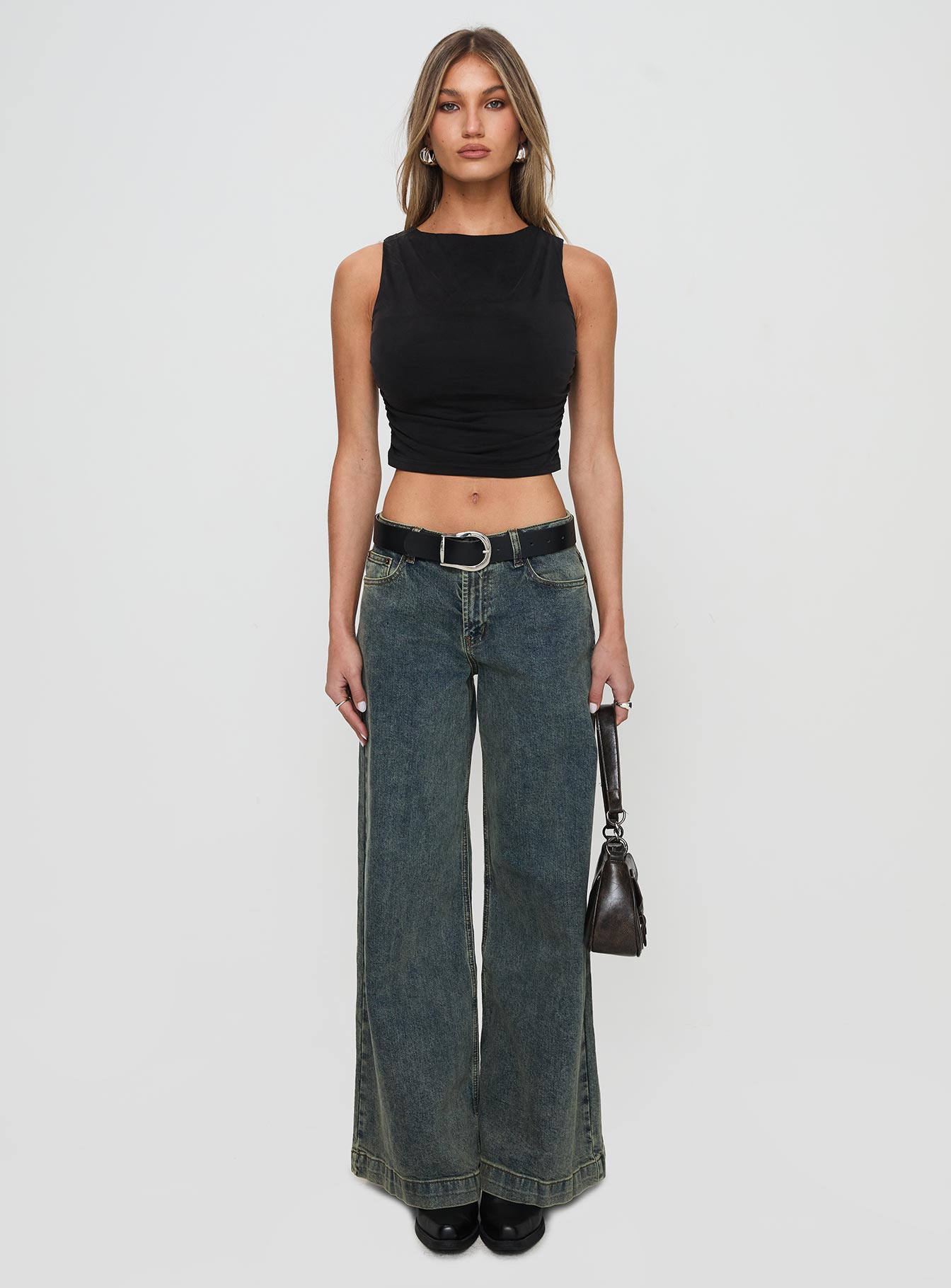 front view of model wearing Princess Polly Hold Em High Neck Top Black Sleeveless High Neck 