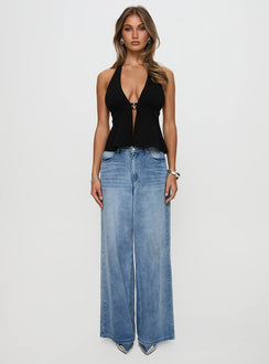 side view of model wearing Princess Polly Brealle Halter Top Black Sleeveless Plunger 