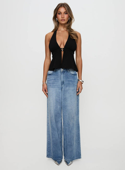 side view of model wearing Princess Polly Brealle Halter Top Black Sleeveless Plunger 