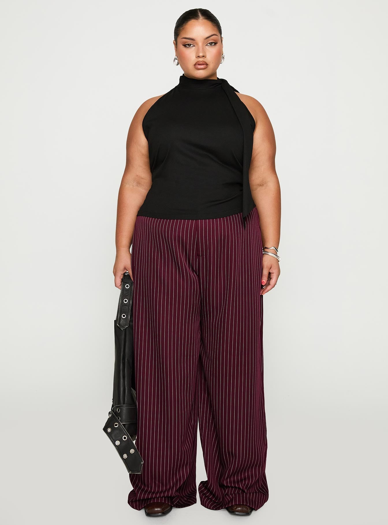 front view of model wearing Princess Polly Lorenne Mid Rise Pant Burgundy Pinstripe Curve 