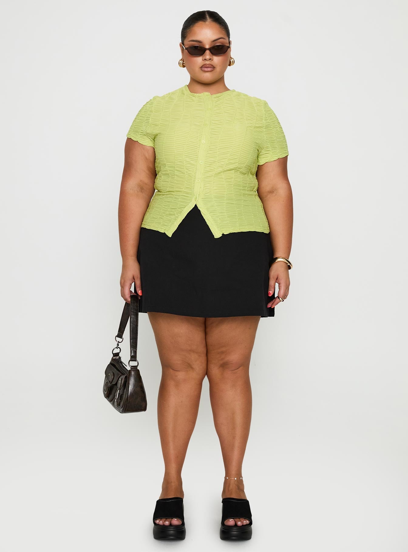 front view of model wearing Princess Polly Suzu Textured Top Green Curve Short Sleeves Crew Neck 