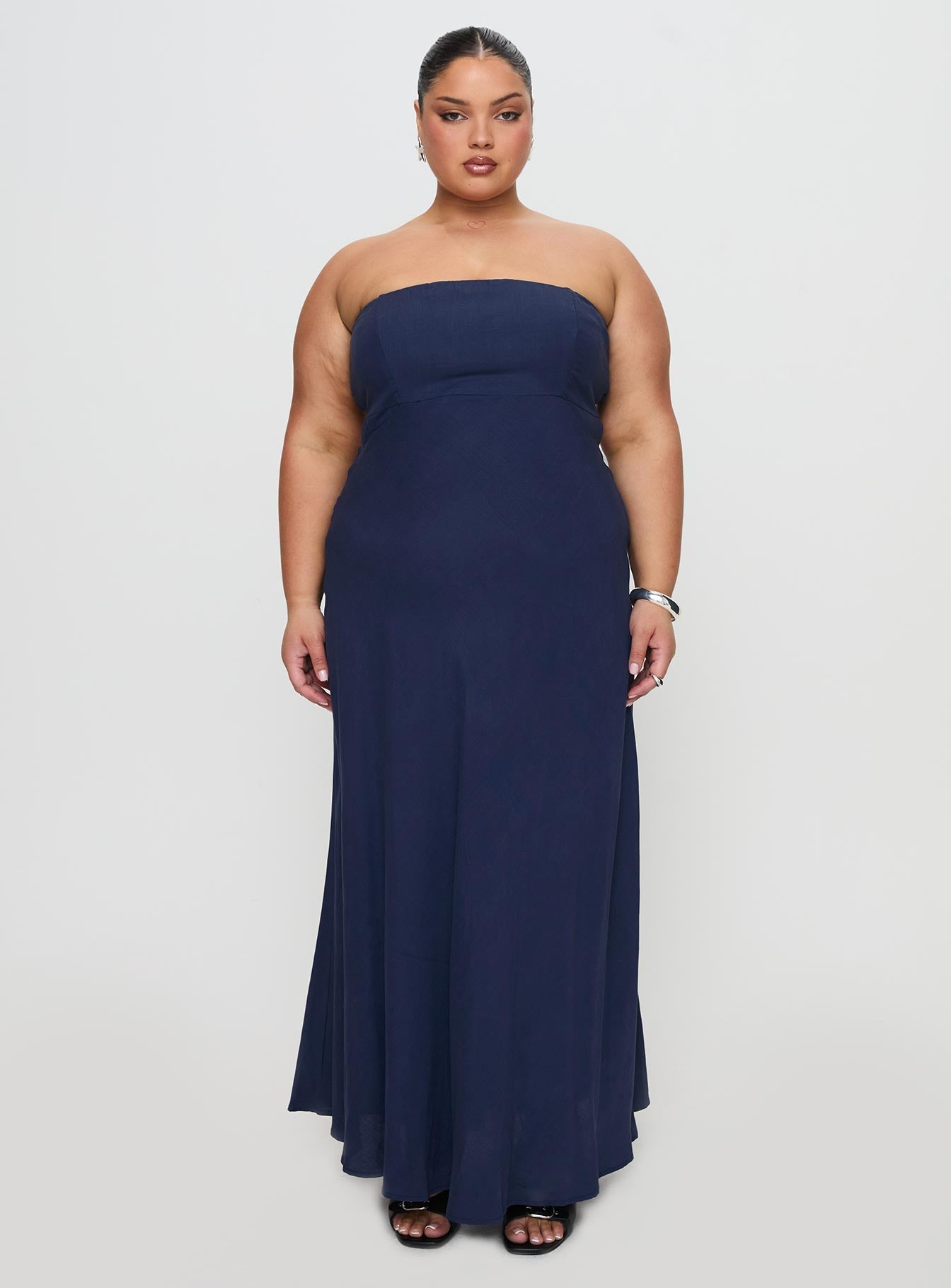 front view of model wearing Princess Polly Yahir Strapless Maxi Dress Navy Curve Straight Neck 