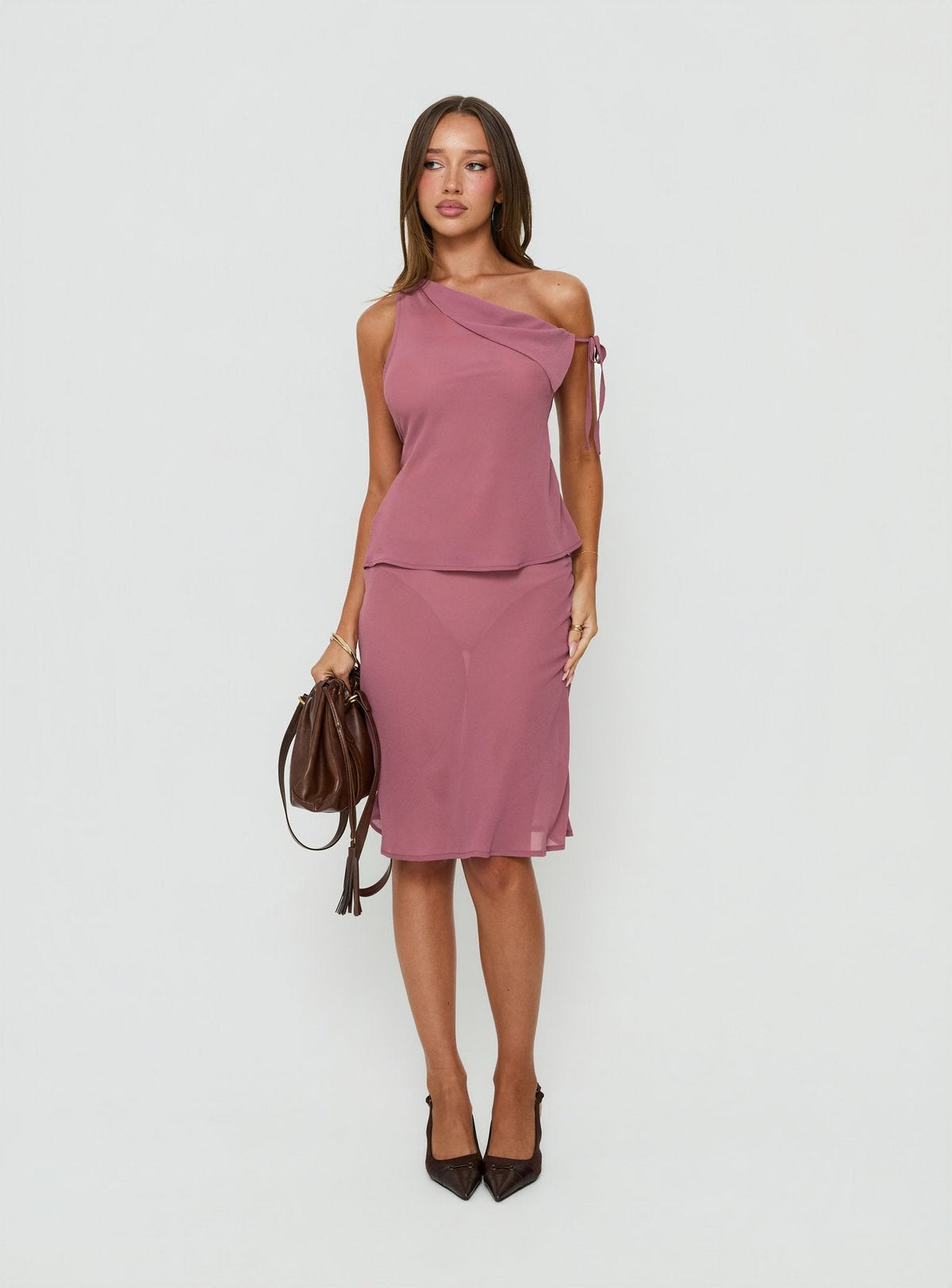 Showcasing the Vianna Sheer Midi Skirt Pink in womens-skirts with midi length front view of model wearing Princess Polly