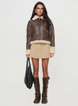 Shearling jacket Oversized fit, classic collar, drop shoulder, exposed zip fastening, twin pockets Non-stretch material, shearling lining