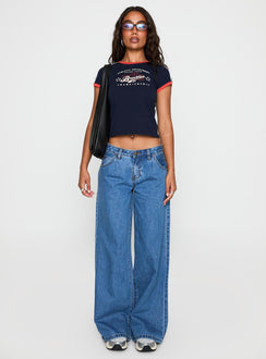 front view of model wearing Princess Polly Supercut Pleat Jean Mid Blue Low Rise Jeans 
