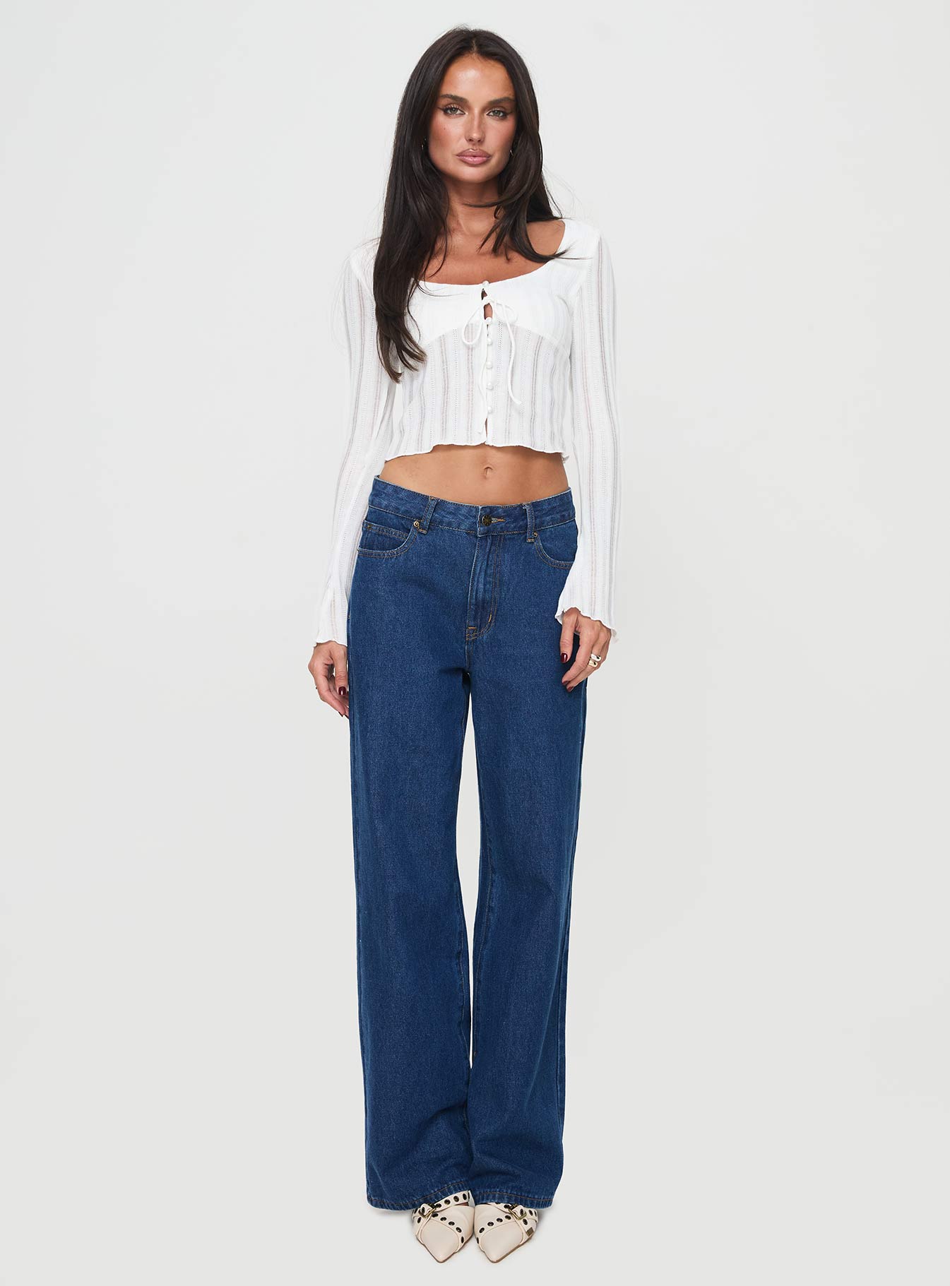 Long sleeve top Scooped neckline, knit material, button fastening at front, tie detail Good stretch, lined bust