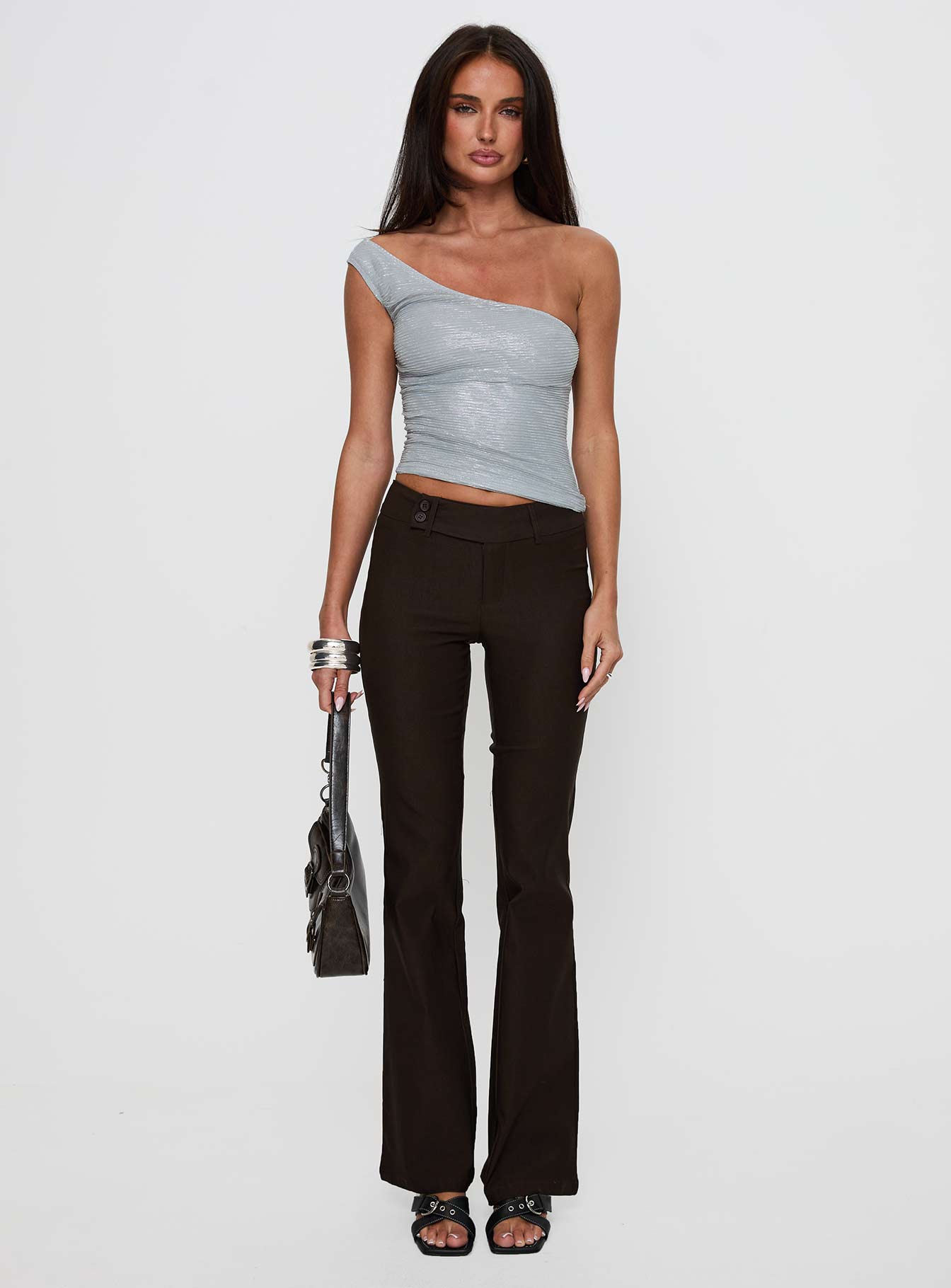 front view of model wearing Princess Polly Kinkirk Flared Pants Chocolate Tall Low Rise Pants 