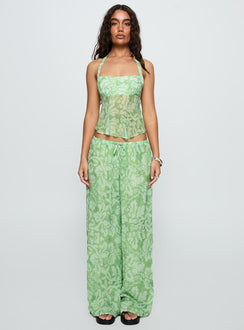 front view of model wearing Princess Polly Finesse Halter Top Green Floral Sleeveless Square Neck 