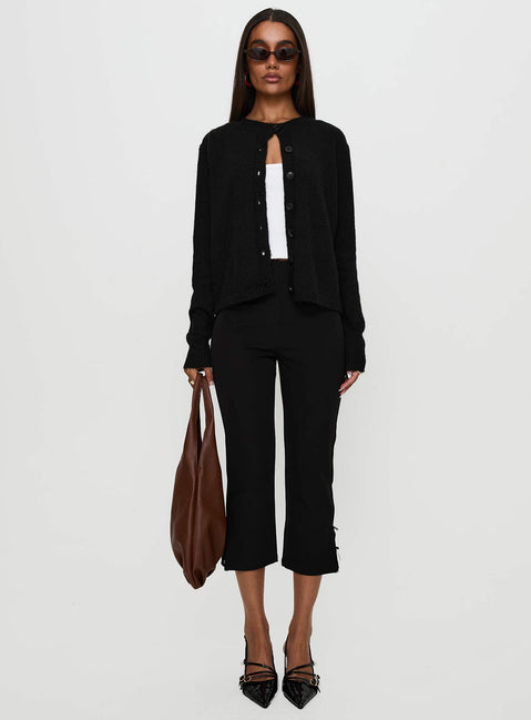 front view of model wearing Princess Polly Denmark Cardigan Black Cropped Jumpers Jumpers 