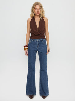 front view of model wearing Princess Polly Magic Mirror Mid Rise Bootleg Jeans Mid Blue Wash Mid Rise Jeans 