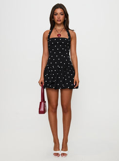 front view of model wearing Princess Polly Gigli Bubble Hem Mini Dress Polka Dot Square Neck 