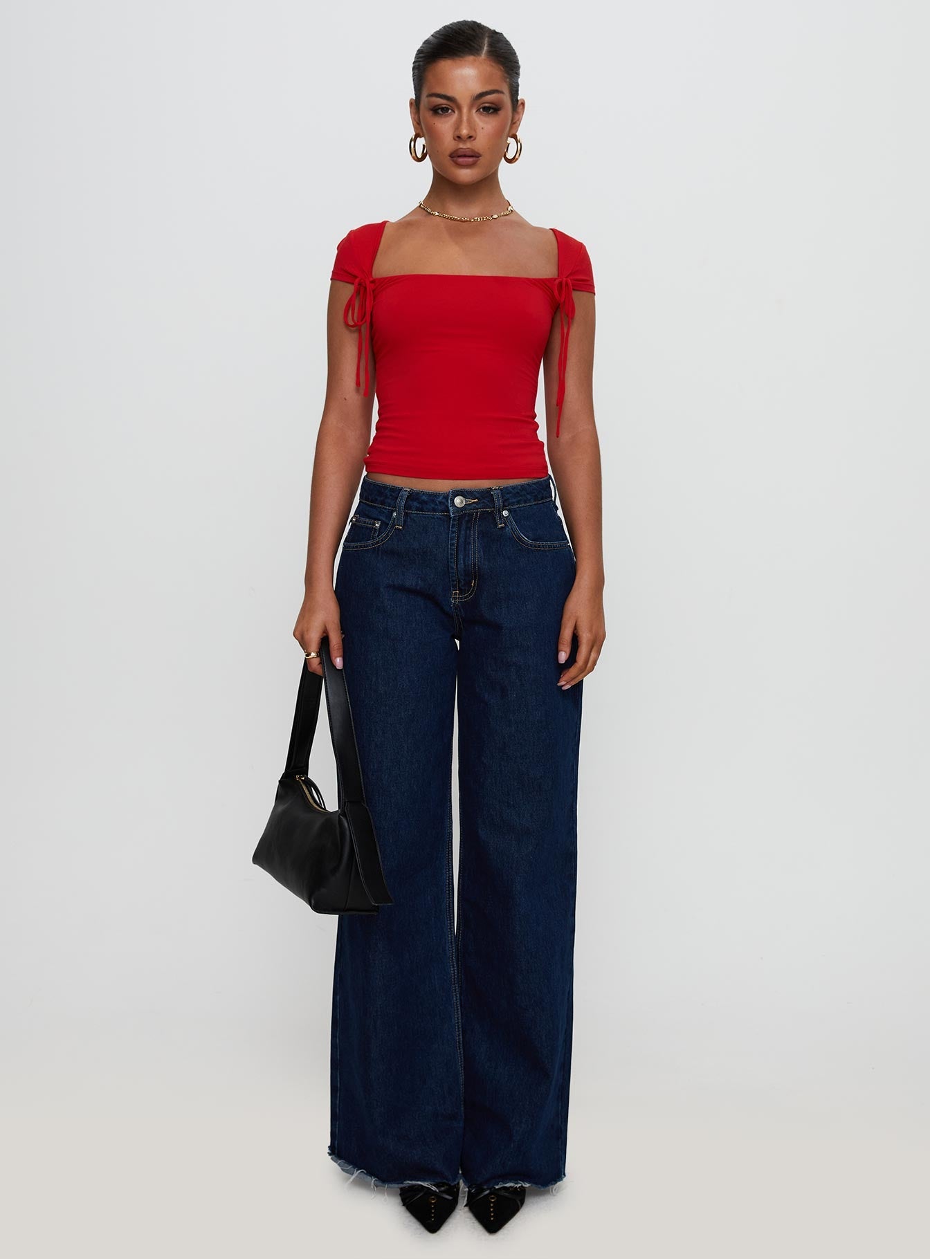 front view of model wearing Princess Polly Daena Tie Detail Top Red Short Sleeves Square Neck 