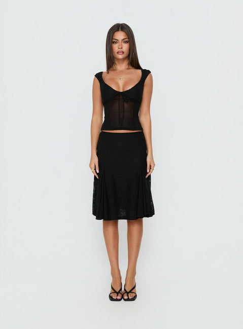 Showcasing the Quani Lace Midi Skirt Black womens-skirts in midi length front view of model wearing Princess Polly