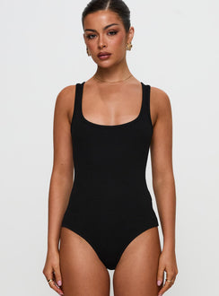 front view of model wearing Princess Polly Baseline Rib Bodysuit Black Sleeveless 