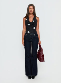 front view of model wearing Princess Polly Cleona Plunge Neck Bodysuit Black Polka Sleeveless Bodysuit 