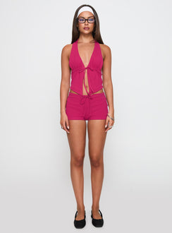 front view of model wearing Princess Polly Obviously Halter Top Pink Sleeveless Plunger 