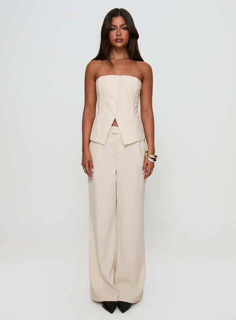 front view of model wearing Princess Polly Lavish Living Strapless Top Cream Sleeveless straight 