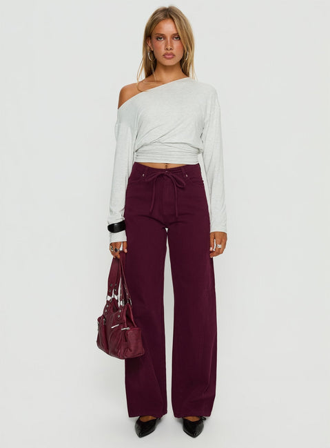side view of model wearing Princess Polly Bruiser Tie Waist Mid Rise Wide Leg Jeans Currant High Rise Jeans Jeans 