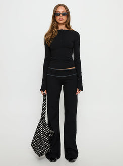 front view of model wearing Princess Polly Kobee Jersey Flare Pants Black / Grey Mid Rise Pants 