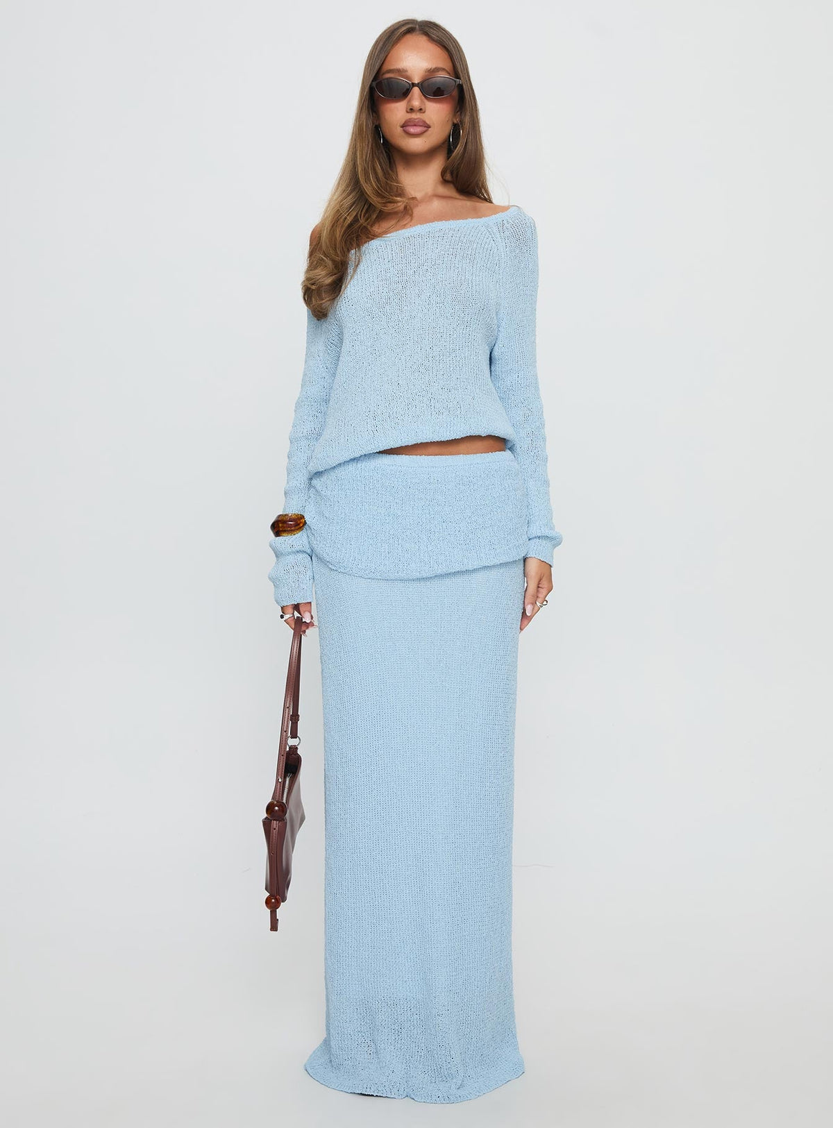 side view of model wearing Princess Polly Ravira Wide Neck Knit Sweater Blue cropped 