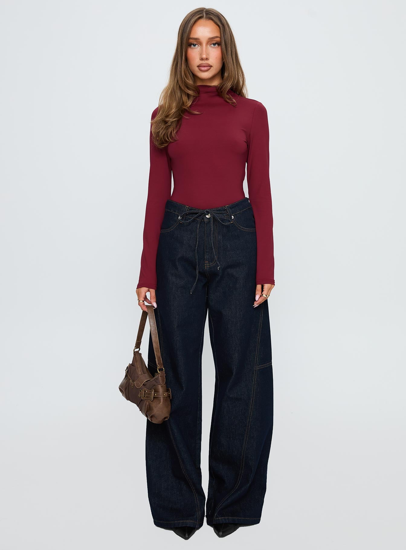 front view of model wearing Princess Polly Augustness Long Sleeve Bodysuit Burgundy Long Sleeve Tops 