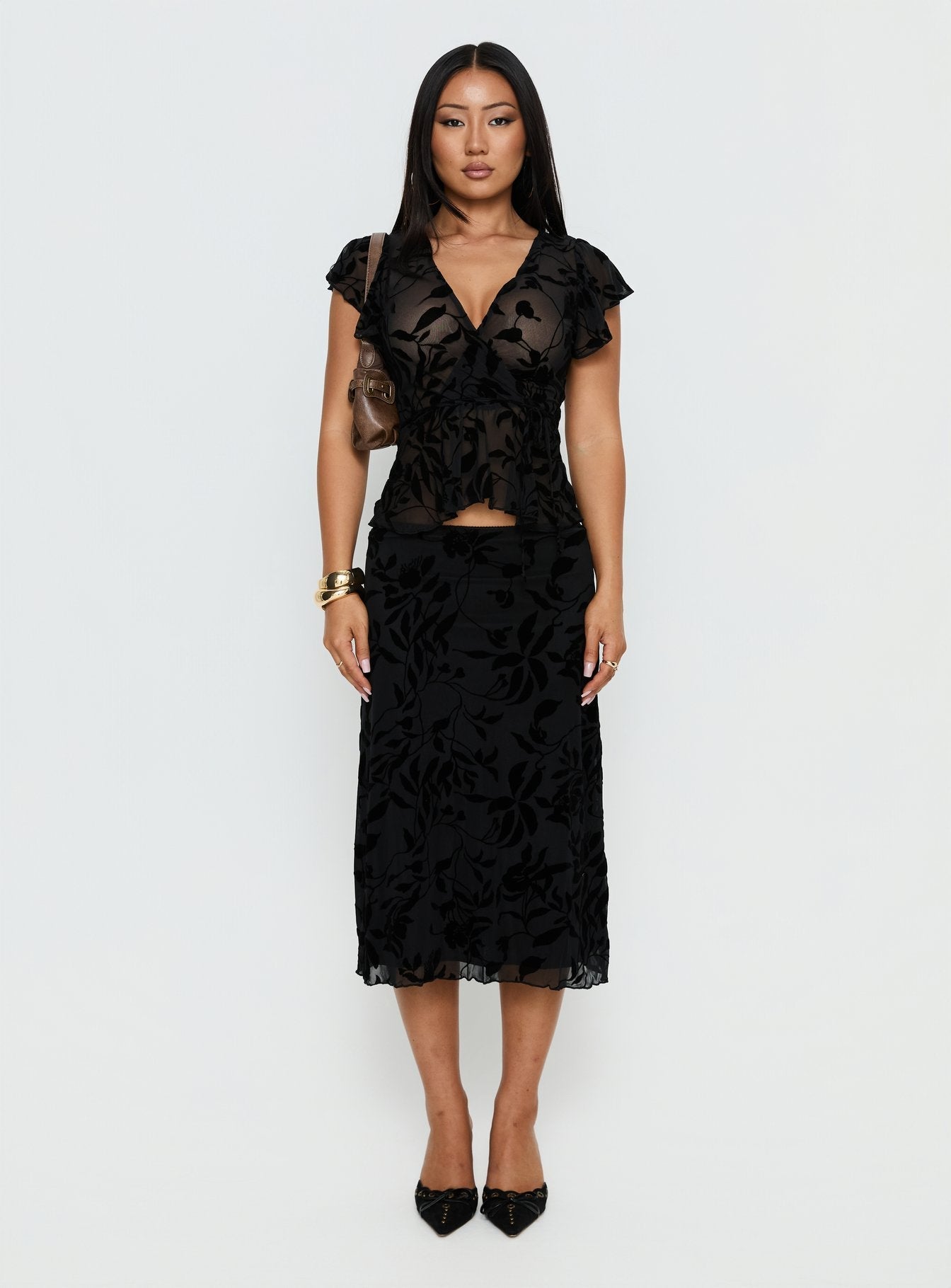   front view of model wearing Princess Polly Atira Midi Skirt Leaf Flower Black Midi Skirts 