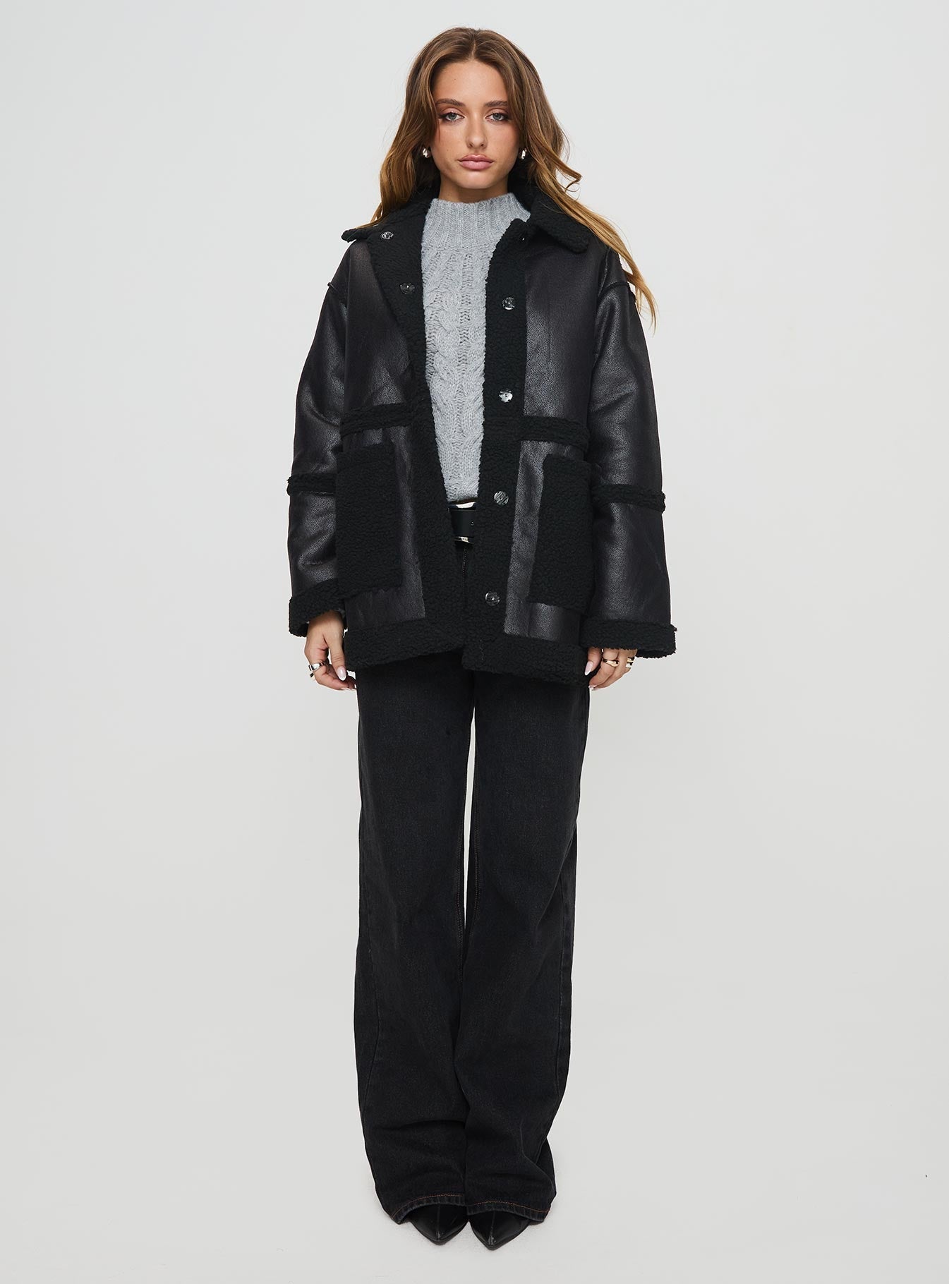 Faux leather jacket  Oversized fit, classic collar, press button fastening, twin hip pockets Non-stretch material, shearling lining