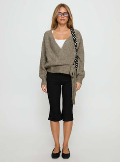 side view of model wearing Princess Polly Daelan Wrap Knit Cardigan Brown regular 